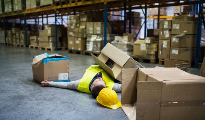 35357-warehouse-worker-after-an-accident-in-a-warehouse-pkzysuy-min